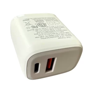 A white Dual USB-C and USB wall charger