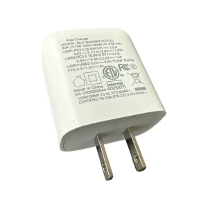 A white dual type-C and USB wall charger