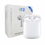 A white i12 Twin Earpods in its base with its packaging behind it